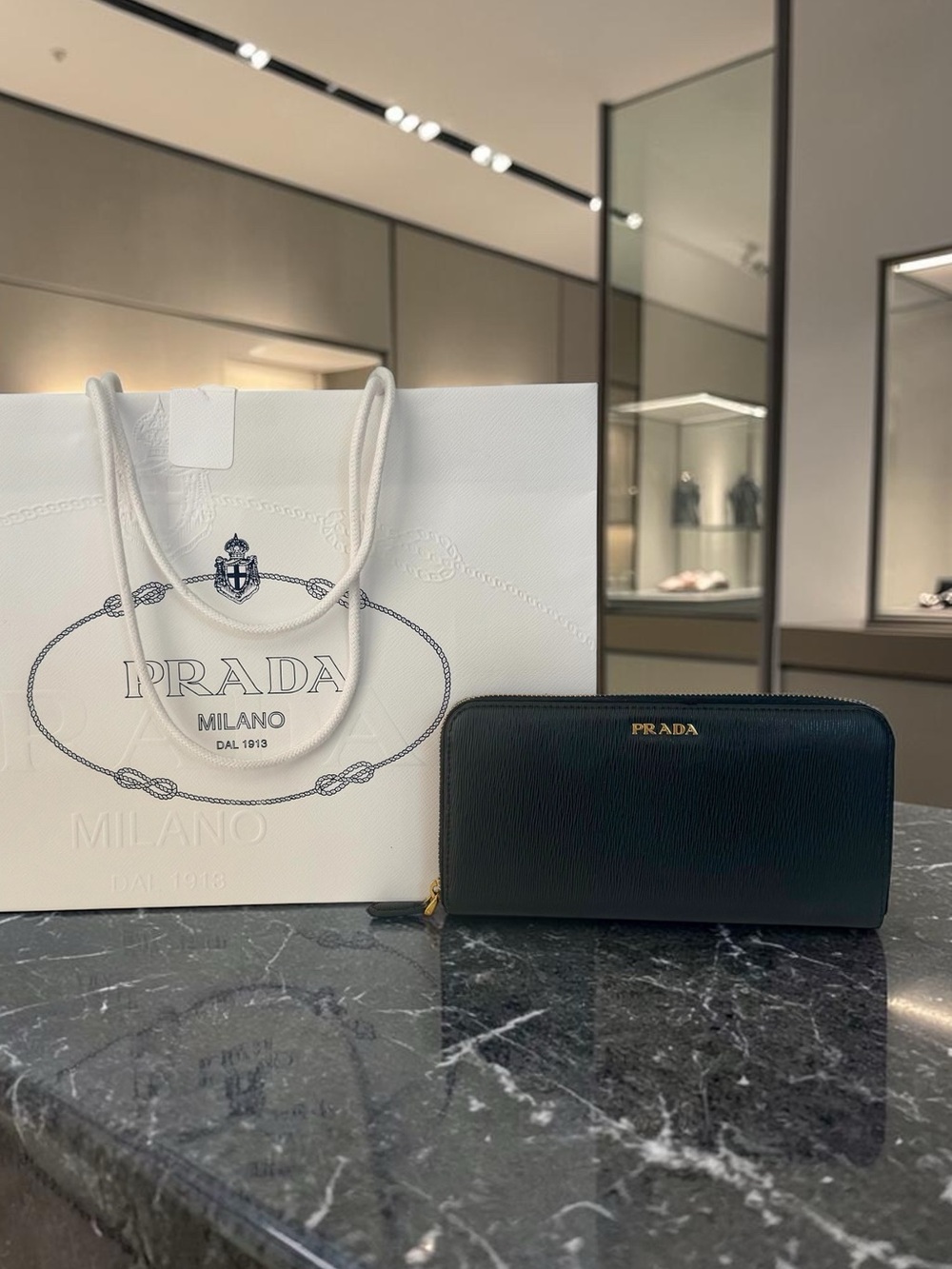 Prada Black Saffiano Zip-Around Clutch with Gold Logo